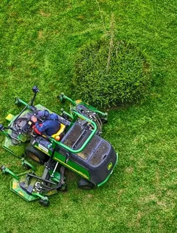 Frank Woods Mowing Grass Stripes